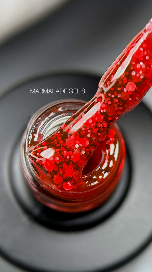 SAGA Professional Gel Polish Marmalade 08 – bold red gel polish with sparkling flakes in a 9ml bottle for eye-catching, textured nail designs.